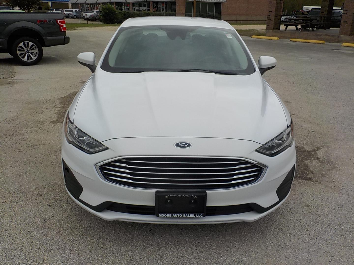 2020 White /Black Ford Fusion SE (3FA6P0HD1LR) with an 1.5L L4 DOHC 16V engine, 6A transmission, located at 1617 W Church Street, Livingston, TX, 77351, (936) 327-3600, 30.710995, -94.951157 - Photo#2